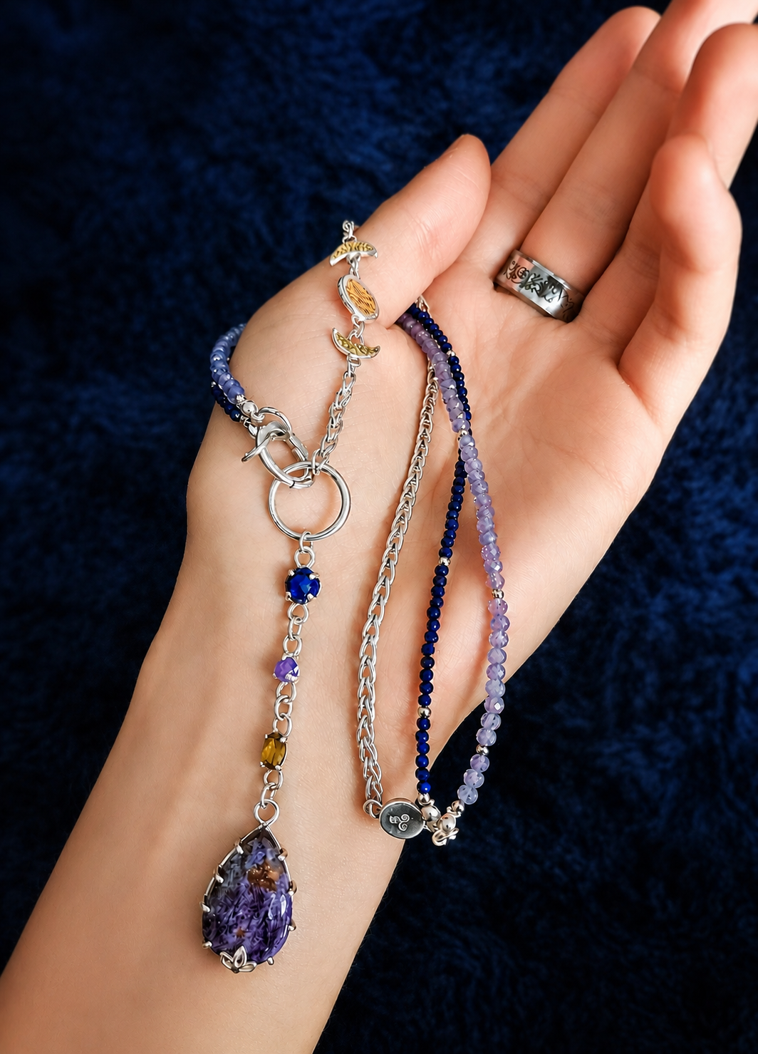 Lucid Dreaming Necklace, held in hand